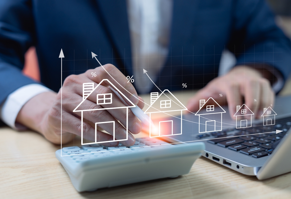 Real,Estate,Investment,Concept,,Home,Loan,Application,,Businessman,Calculate,Investment